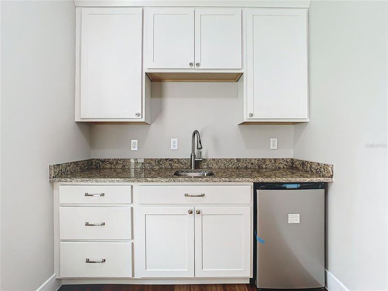 wet bar in extra room off bedroom 3