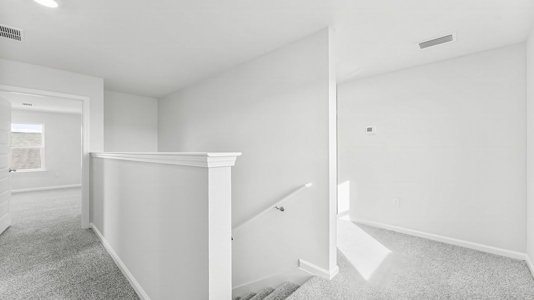 Representative unfurnished interior of a home built from the The Aisle by D.R. Horton in Titus Park, Panama City (Image 27).