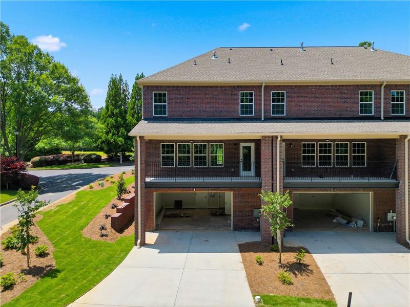 Front exterior of a new home in , Cumming, GA, highlighting curb appeal (Image 22).