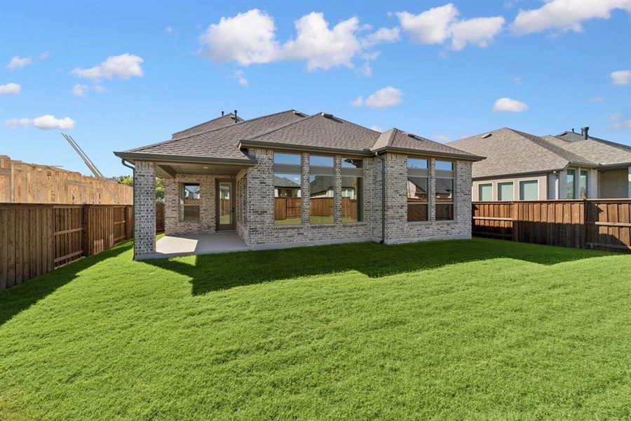 Exterior details and patio area of a home in Mantua Point Classics, Van Alstyne (Image 2). Exterior details and patio area of a home in Mantua Point Classics, Van Alstyne (Image 2).