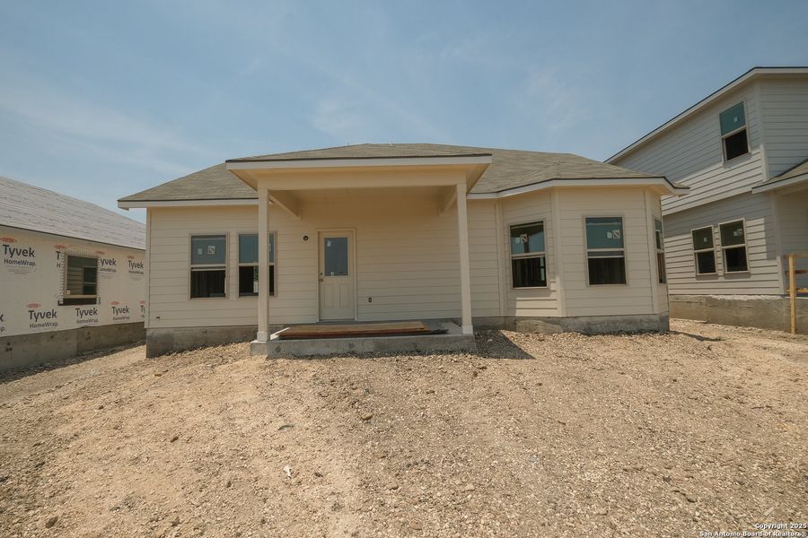 Front exterior of a new home in Paloma Park, Converse, TX, highlighting curb appeal (Image 16). Front exterior of a new home in Paloma Park, Converse, TX, highlighting curb appeal (Image 16).