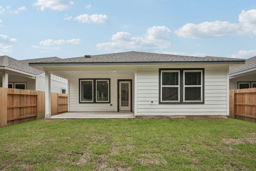 Front exterior of a new home in , New Caney, TX, highlighting curb appeal (Image 13).