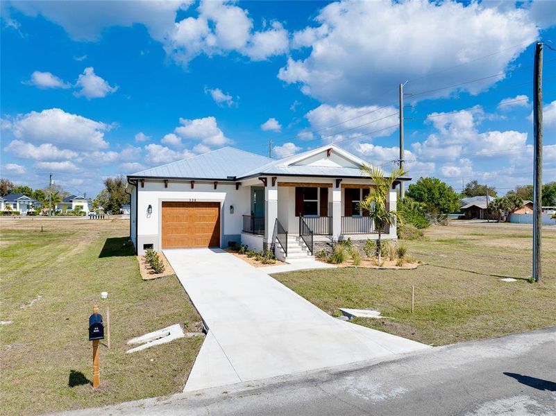 Front exterior of a new home in , Punta Gorda, FL, highlighting curb appeal (Image 27). Front exterior of a new home in , Punta Gorda, FL, highlighting curb appeal (Image 27).