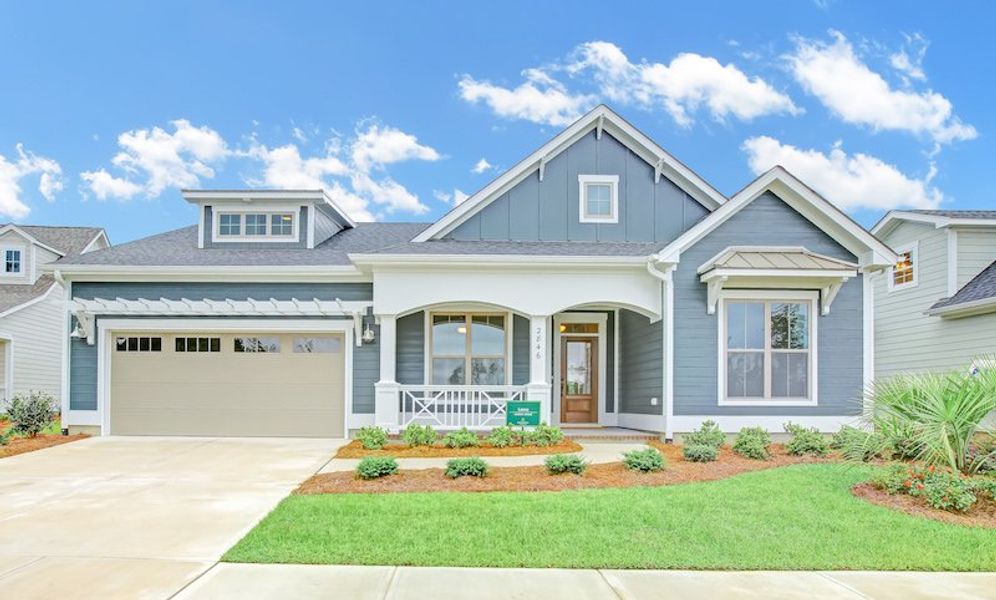 Representative exterior photo of a completed home built from the Lanai by Bill Clark Homes in Sidbury Landing, Wilmington, NC (Image 30). Representative exterior photo of a completed home built from the Lanai by Bill Clark Homes in Sidbury Landing, Wilmington, NC (Image 30).