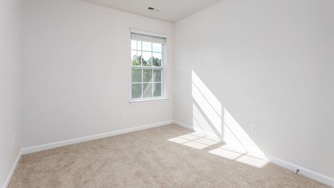 Representative unfurnished interior of a home built from the NEWTON by D.R. Horton in Henley Ridge, Graham (Image 18).