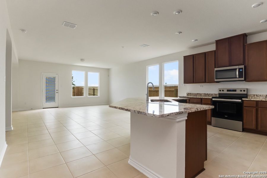 Furnished interior view inside a new home in Preserve at Culebra - Classic Collection, San Antonio (Image 4).