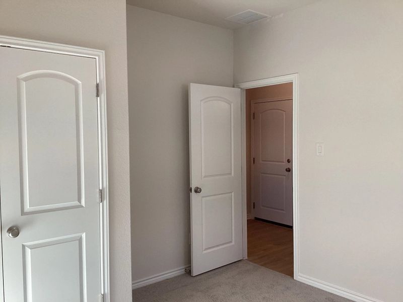 Spacious, unfurnished interior of a new home in The Homestead at Lariat, Liberty Hill (Image 20).