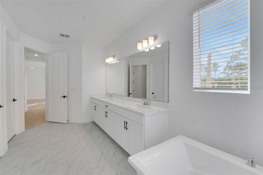 Furnished interior view inside a new home in Palms at Windermere, Windermere (Image 10).