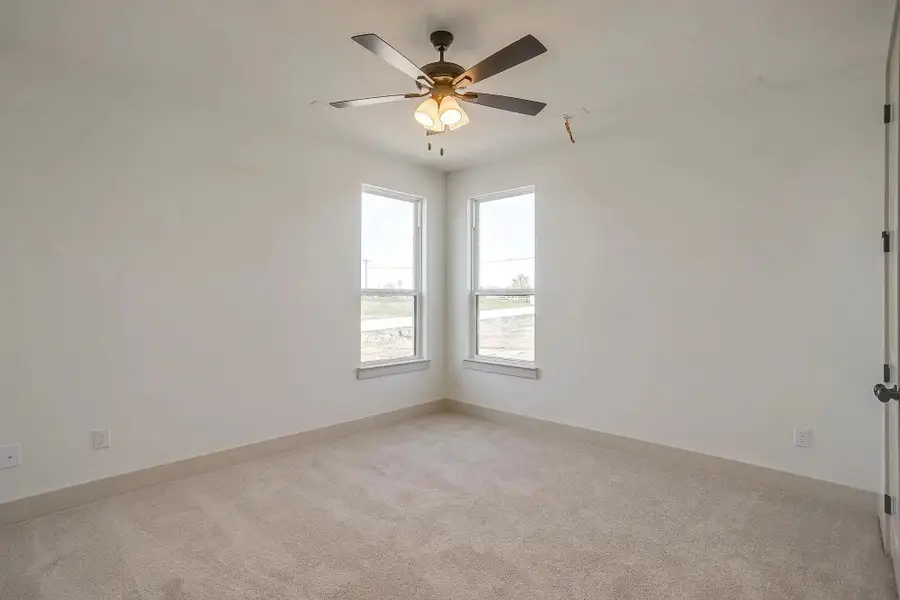 Representative unfurnished interior of a home built from the The Carley by Elmwood Custom Homes in Byrum Ranch, Maypearl (Image 45).