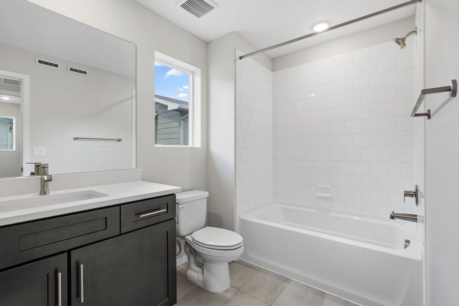 Furnished interior view inside a new home in Barefoot Village, Firestone (Image 10).