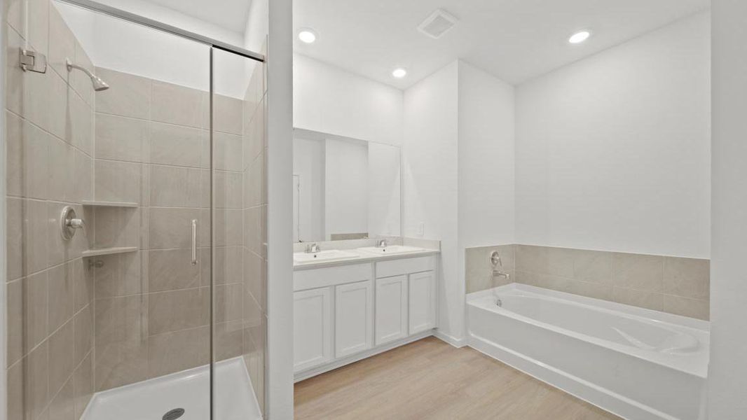 Furnished interior view inside a new home in Sunterra Lakes, Brookshire (Image 9).