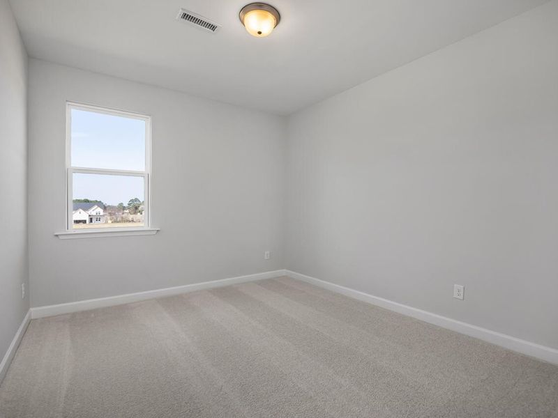 Spacious, unfurnished interior of a new home in Tobacco Road, Angier (Image 36).