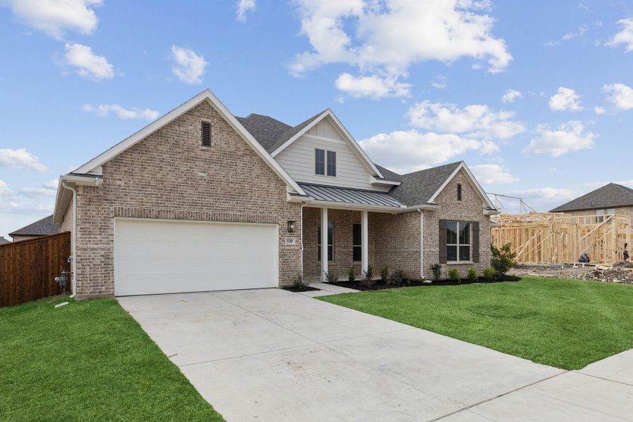 Front exterior of a new home in Dove Hollow, Waxahachie, TX, highlighting curb appeal (Image 2). Front exterior of a new home in Dove Hollow, Waxahachie, TX, highlighting curb appeal (Image 2).