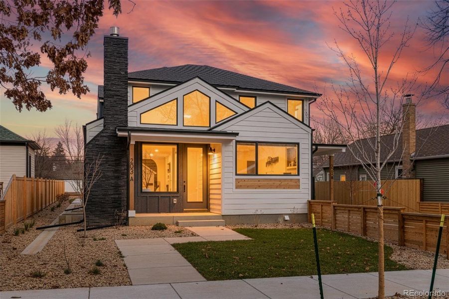 Front exterior of a new home in , Lafayette, CO, highlighting curb appeal (Image 1). Front exterior of a new home in , Lafayette, CO, highlighting curb appeal (Image 1).
