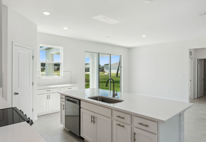 Representative furnished interior of a home built from the Florence by Hartizen Homes in Estes Reserve, Eustis (Image 8).