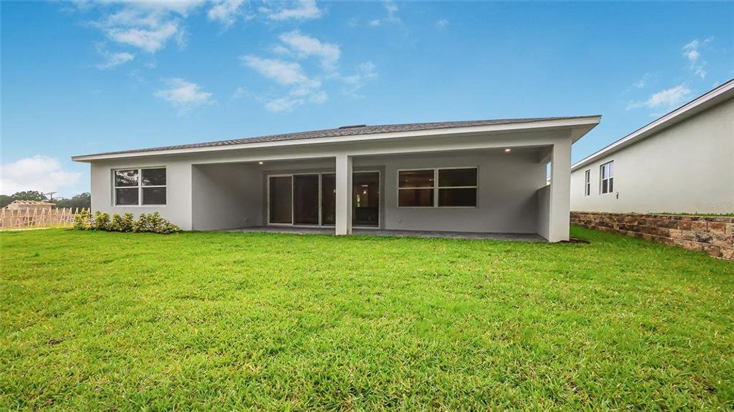 Exterior details and patio area of a home in Cresswind at Hammock Oaks, Lady Lake (Image 4). Exterior details and patio area of a home in Cresswind at Hammock Oaks, Lady Lake (Image 4).