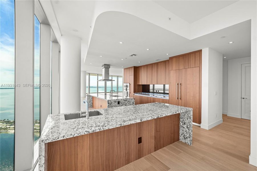 Furnished interior view inside a new home in Una Residences, Miami (Image 9).