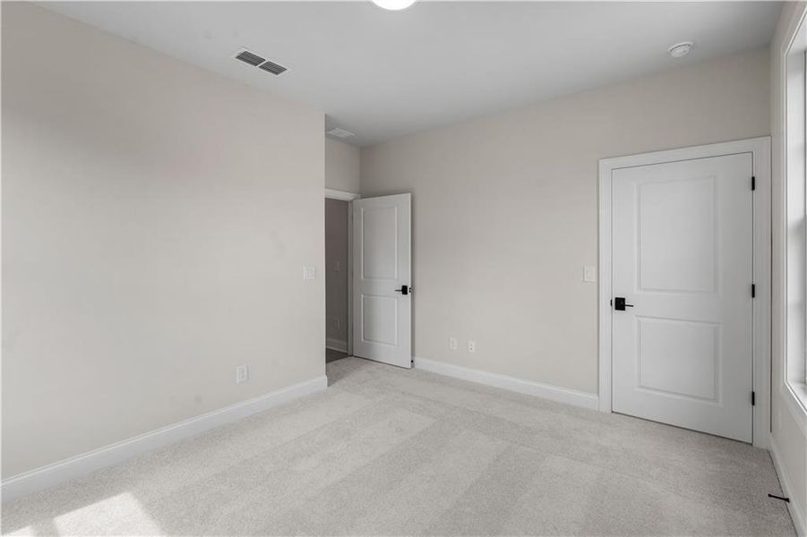 Spacious, unfurnished interior of a new home in Ward's Crossing Townhomes, Johns Creek (Image 36).
