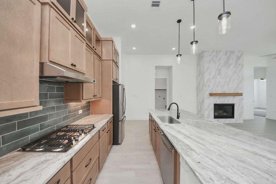 Representative furnished interior of a home built from the Summerton by Chesmar Homes in Meridiana 50's and 60's, Manvel (Image 35).