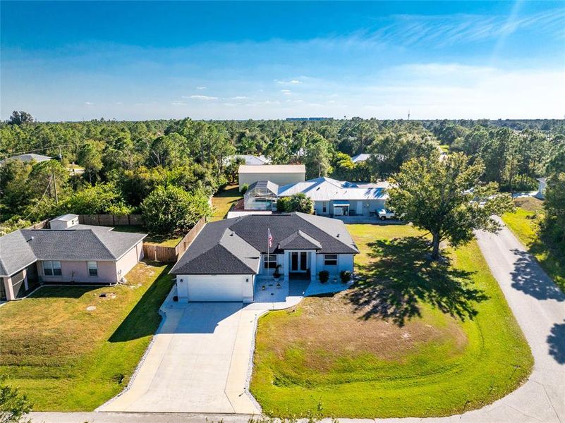 Front exterior of a new home in , Punta Gorda, FL, highlighting curb appeal (Image 21).
