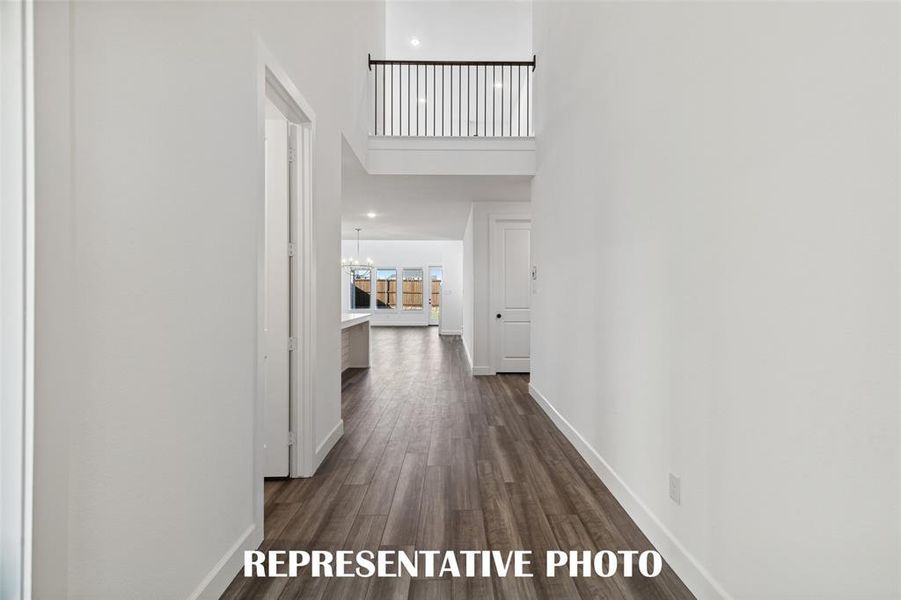 Open the door, step inside and experience high ceilings, open railing and site lines through to the rear of this dream home! REPRESENTATIVE PHOTO Open the door, step inside and experience high ceilings, open railing and site lines through to the rear of this dream home! REPRESENTATIVE PHOTO