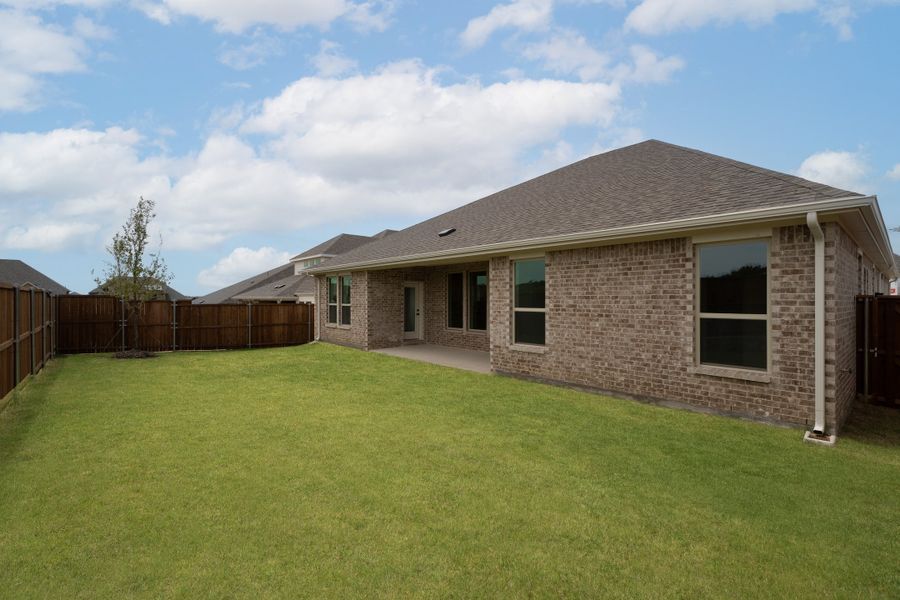Exterior details and patio area of a home in Enclave at Legacy Hills, Celina (Image 2).