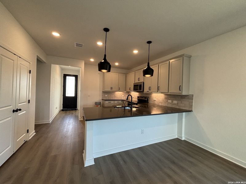 Furnished interior view inside a new home in The Summit at Saddlebrook Ranch 55's, Schertz (Image 7).