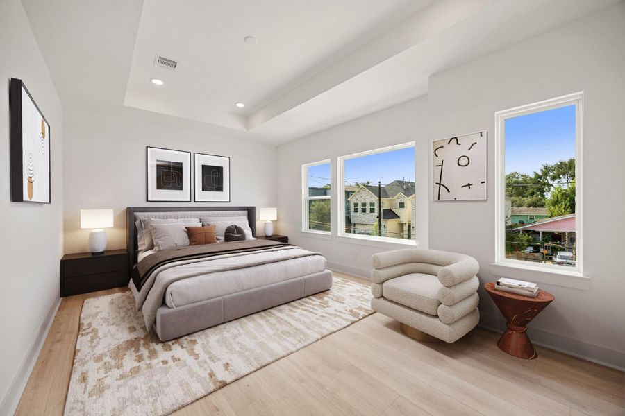 What a wonderful place to come home to! This stunning primary suite greets you with gorgeous wood like vinyl floors, neutral paint, high ceiling, large windows allowing in natural light brightening up this spacious primary bedroom with extra space for a seating area. What a wonderful place to come home to! This stunning primary suite greets you with gorgeous wood like vinyl floors, neutral paint, high ceiling, large windows allowing in natural light brightening up this spacious primary bedroom with extra space for a seating area.