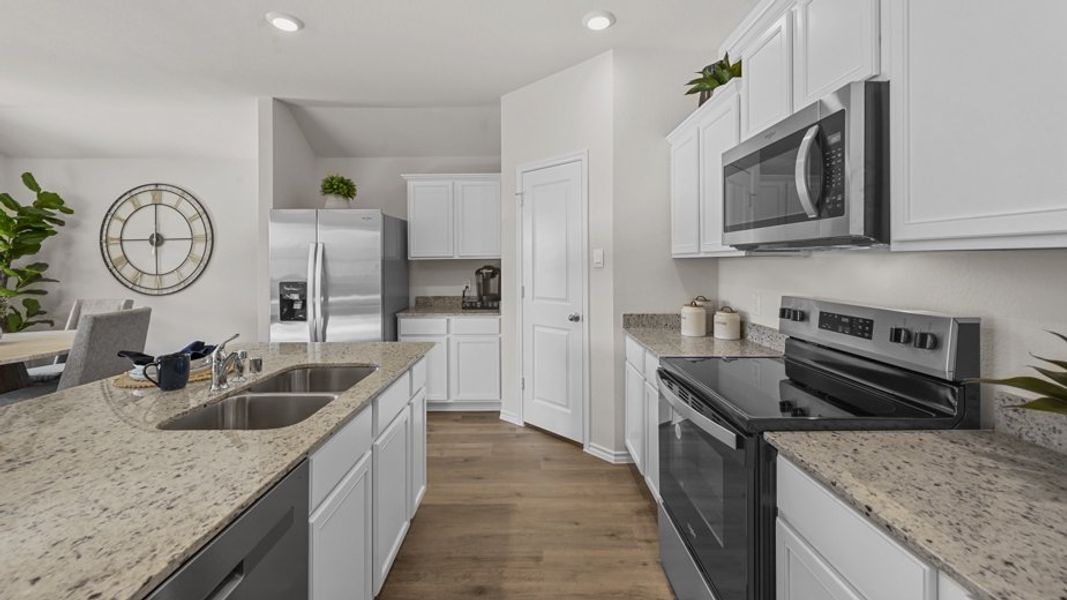 Furnished interior view inside a new home in Stonewyck Farms, Ennis (Image 6).