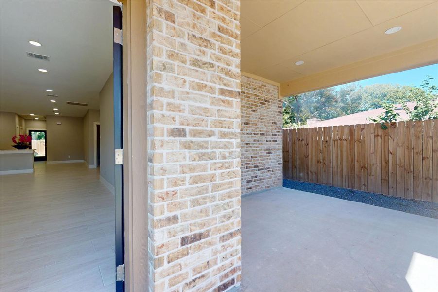 Exterior details and patio area of a home in , Houston (Image 1).