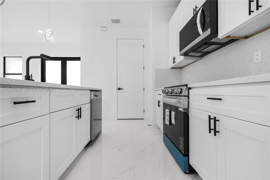 Furnished interior view inside a new home in , Lehigh Acres (Image 13). Furnished interior view inside a new home in , Lehigh Acres (Image 13).