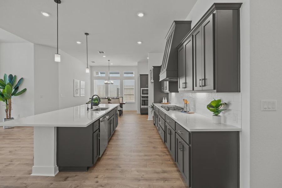 Representative furnished interior of a home built from the Silas by Chesmar Homes in 6 Creeks, Kyle (Image 5).