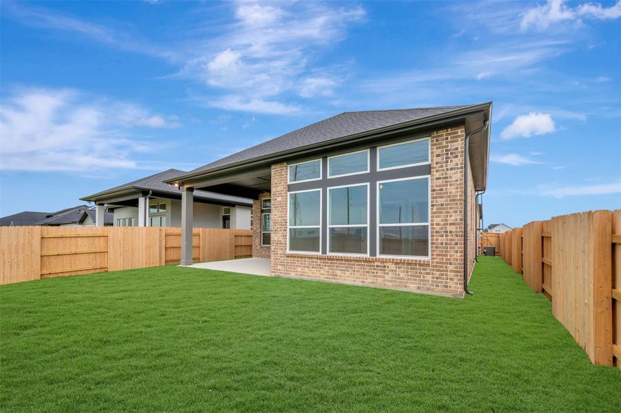 Exterior details and patio area of a home in Elyson - Reserve Collection, Katy (Image 23).