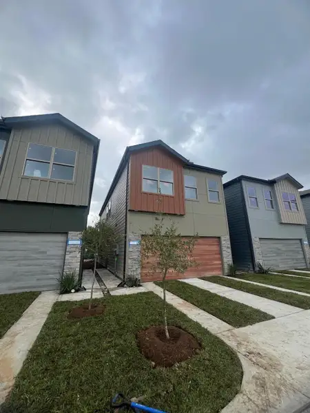 Front exterior of a new home in , Houston, TX, highlighting curb appeal (Image 18).