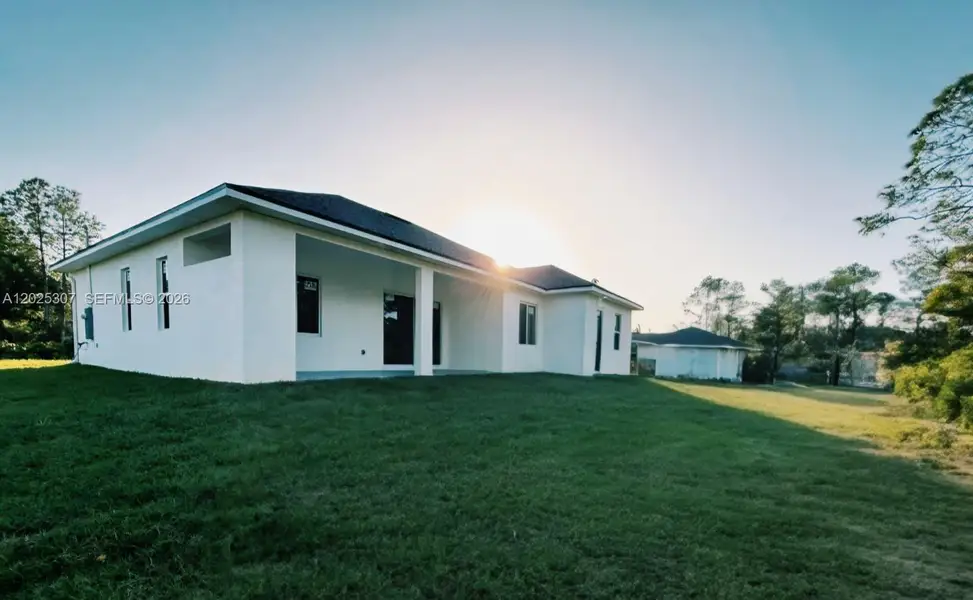 Exterior details and patio area of a home in , Lehigh Acres (Image 3).