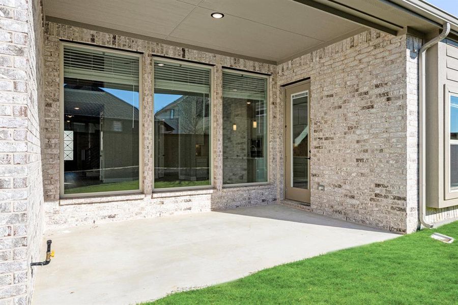 Exterior details and patio area of a home in Creekview Meadows, Pilot Point (Image 4). Exterior details and patio area of a home in Creekview Meadows, Pilot Point (Image 4).