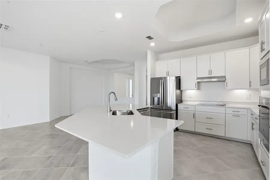 Furnished interior view inside a new home in Wellen Park Golf & Country Club, Venice (Image 11).