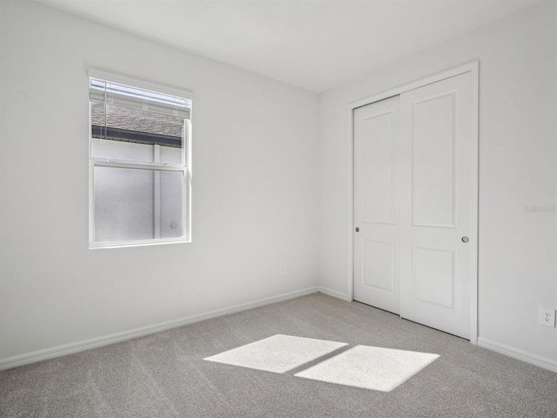 Spacious, unfurnished interior of a new home in Coasterra - Reserve Series, Palmetto (Image 22).