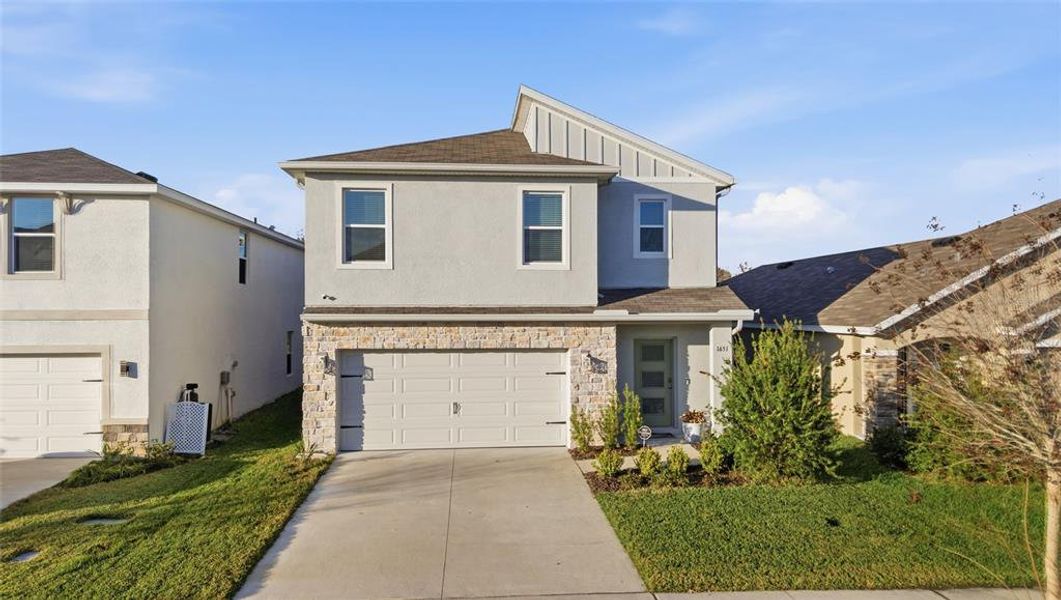 Front exterior of a new home in , Plant City, FL, highlighting curb appeal (Image 22). Front exterior of a new home in , Plant City, FL, highlighting curb appeal (Image 22).