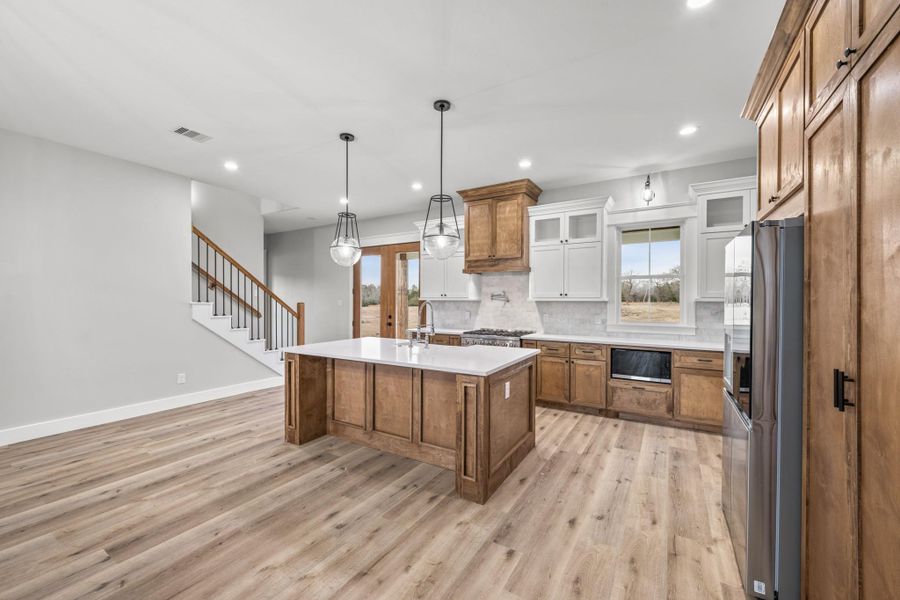 Furnished interior view inside a new home in , New Waverly (Image 12).