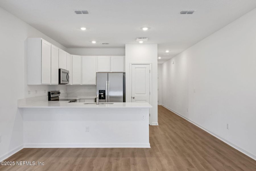 Furnished interior view inside a new home in , Jacksonville (Image 5).