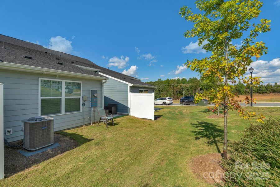 Front exterior of a new home in , Troutman, NC, highlighting curb appeal (Image 20).