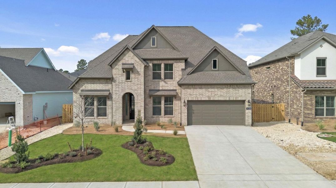 Front exterior of a new home in Colton, Montgomery, TX, highlighting curb appeal (Image 21).