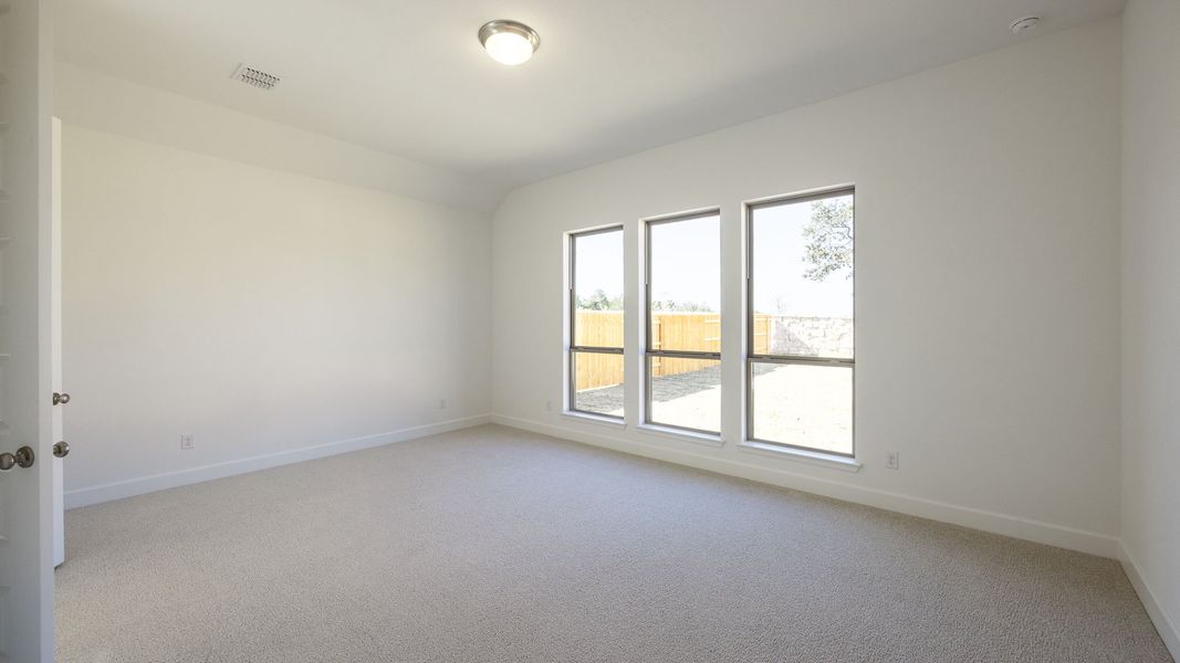 Spacious, unfurnished interior of a new home in Parkside On The River, Georgetown (Image 20).