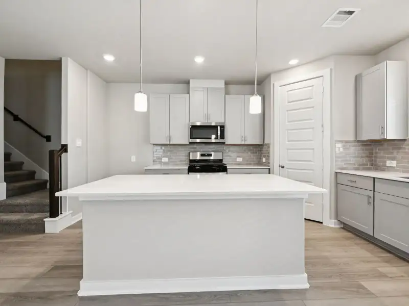 Furnished interior view inside a new home in Bridge Creek Village - City Series, Cypress (Image 6). Furnished interior view inside a new home in Bridge Creek Village - City Series, Cypress (Image 6).