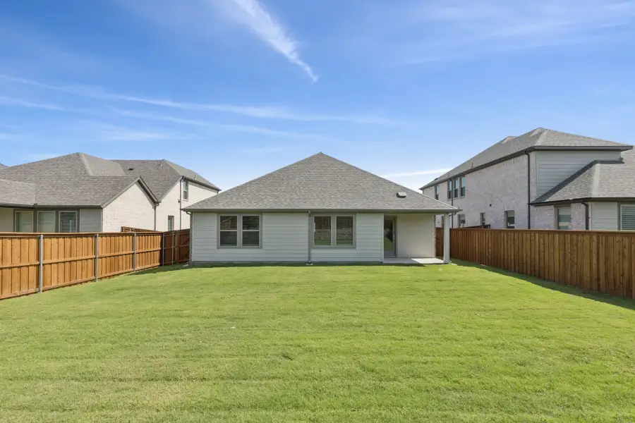 Covered Patio in the Heisman home plan by Trophy Signature Homes – REPRESENTATIVE PHOTO