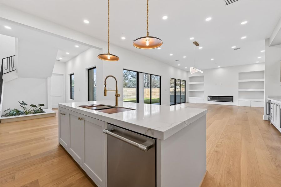 Open dining area seamlessly flow into the kitchen and living area.