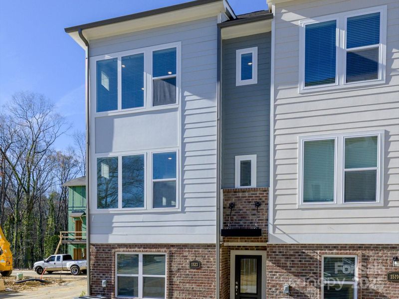 Exterior details and patio area of a home in Central Living at Craig, Charlotte (Image 18).