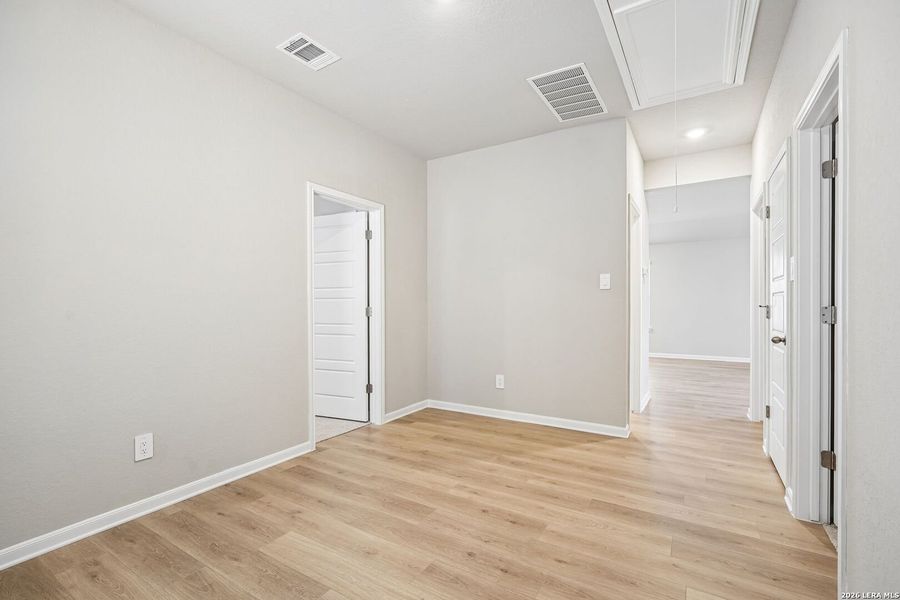 Spacious, unfurnished interior of a new home in Remington Ranch, San Antonio (Image 40).
