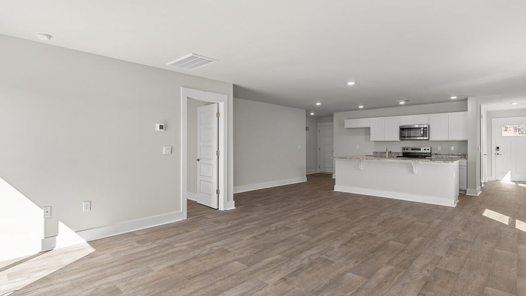 Spacious, unfurnished interior of a new home in Sidbury Station, Castle Hayne (Image 19).